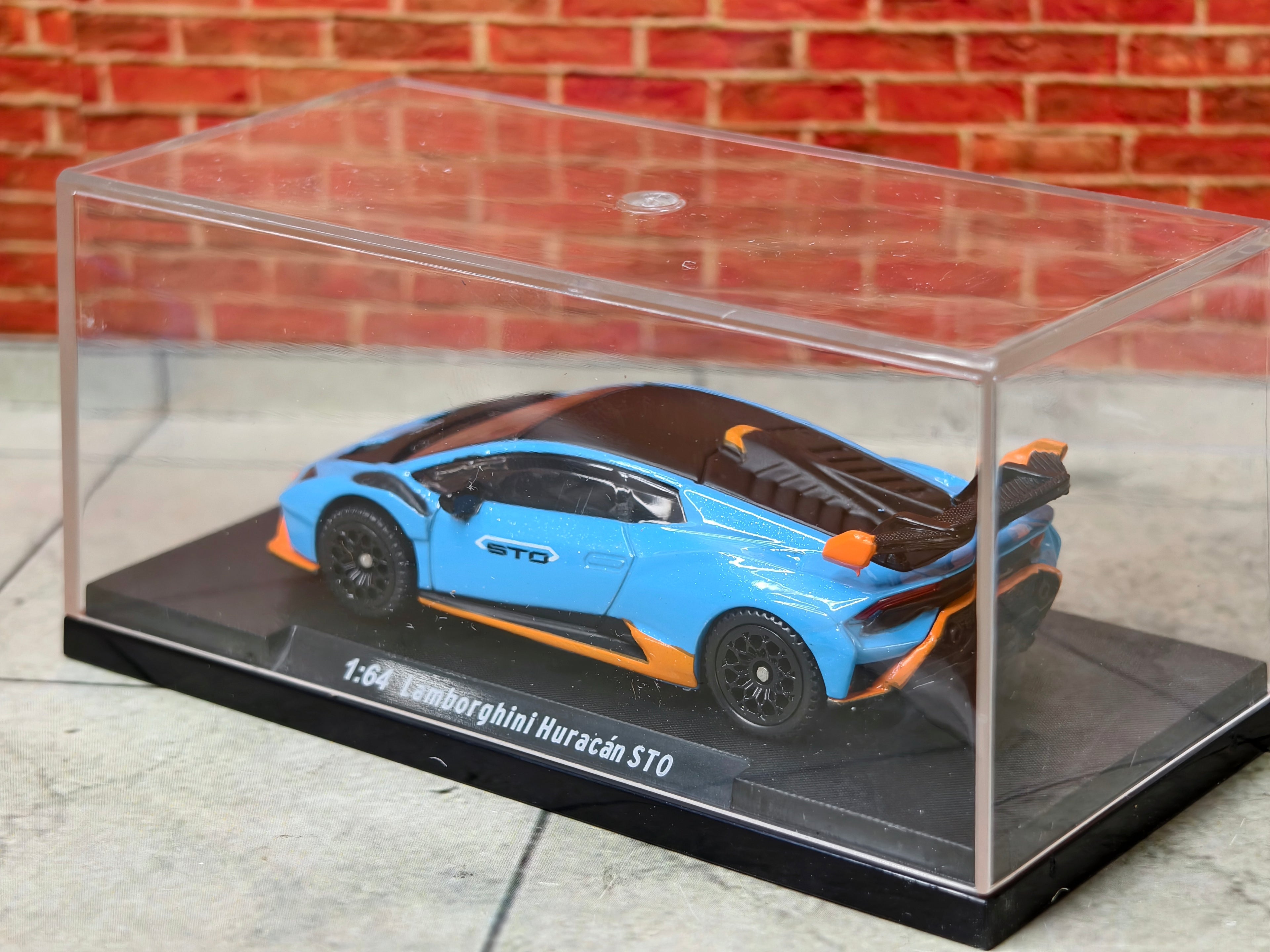 CCA Official Licensed  Lamborghini Huracan STO 1:64 Scale Premium in Acrylic Box
