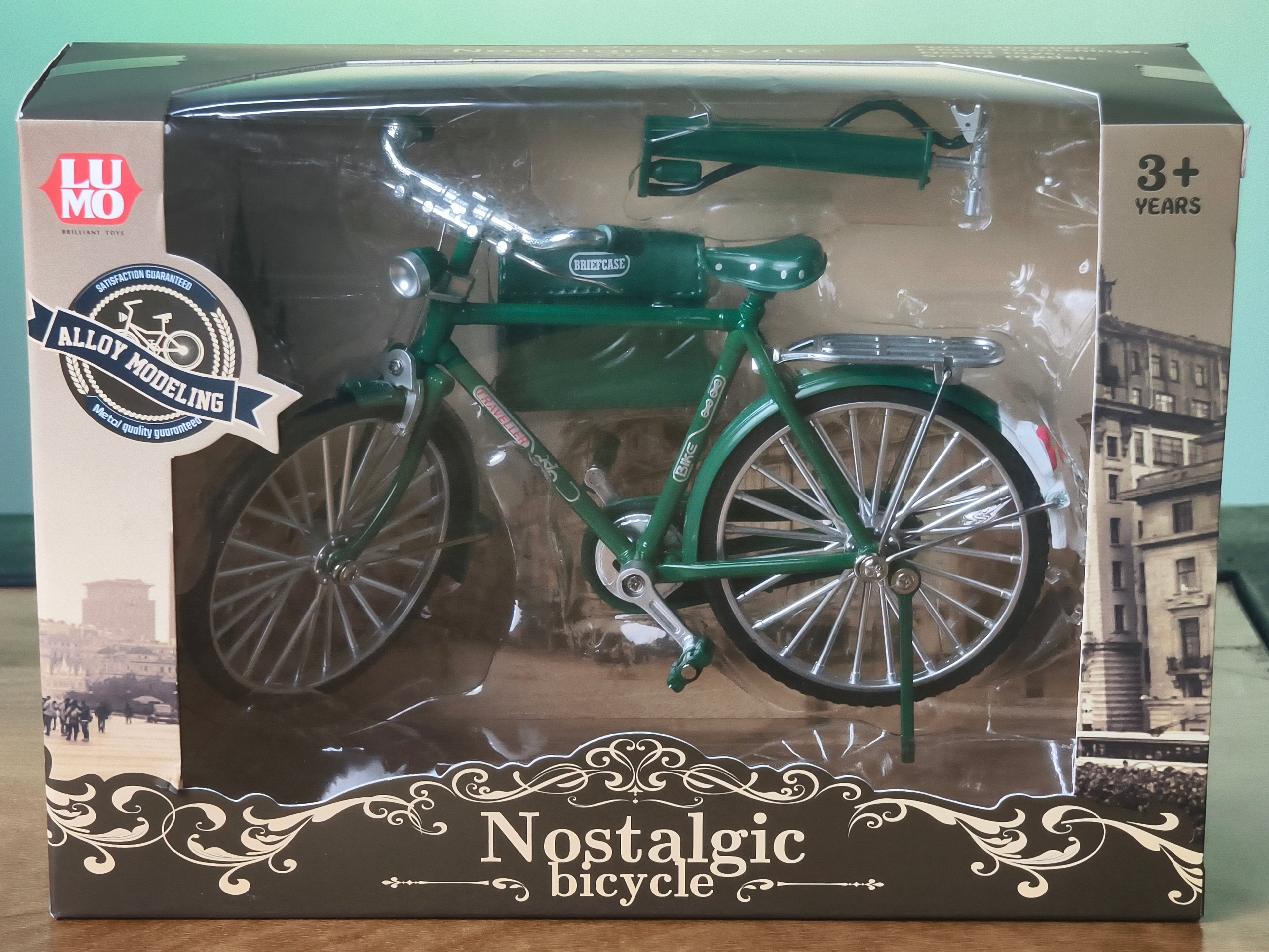 Vintage Diecast Cycle Model with Briefcase and Pump