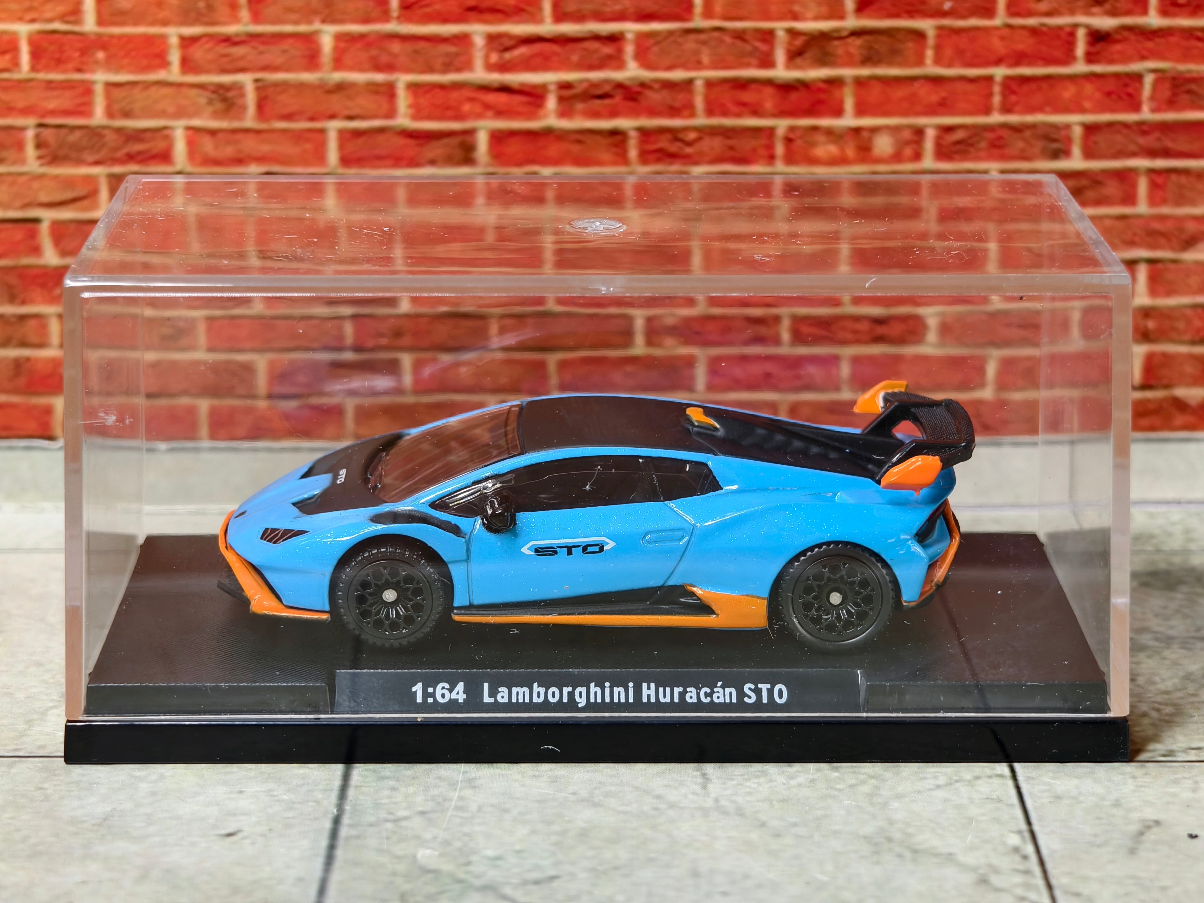 CCA Official Licensed  Lamborghini Huracan STO 1:64 Scale Premium in Acrylic Box