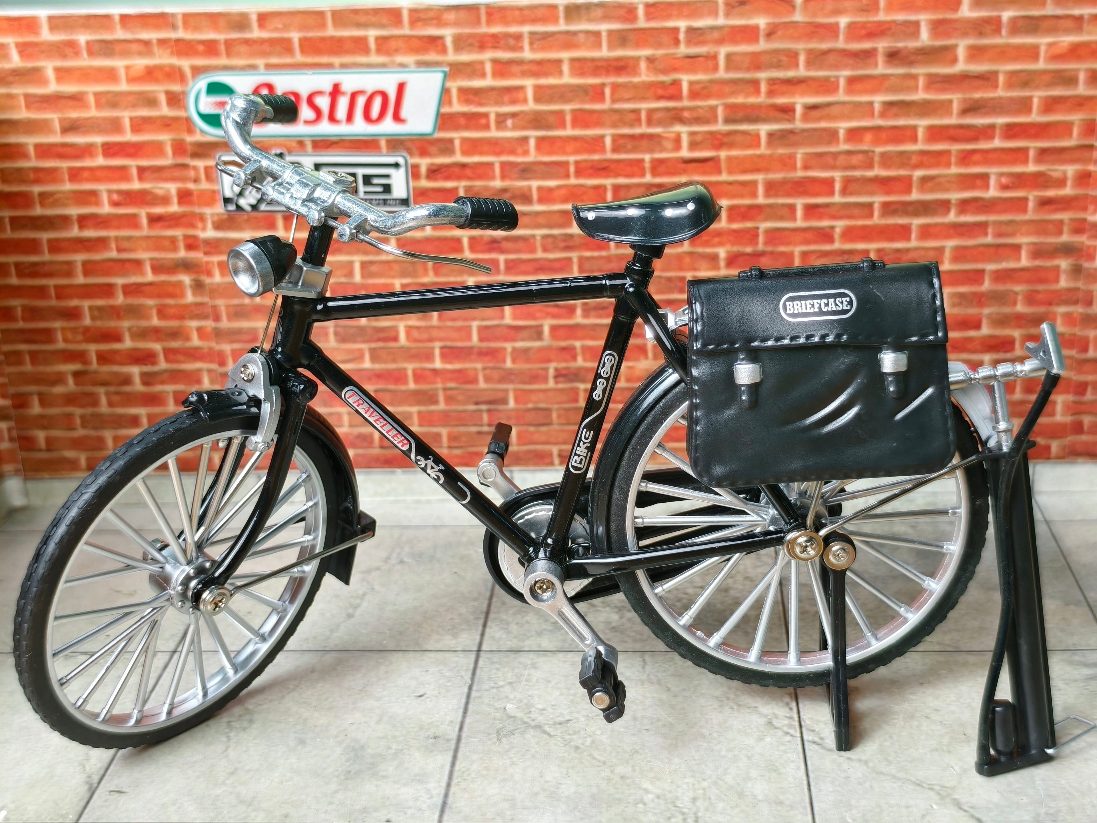 Vintage Diecast Cycle Model with Briefcase and Pump
